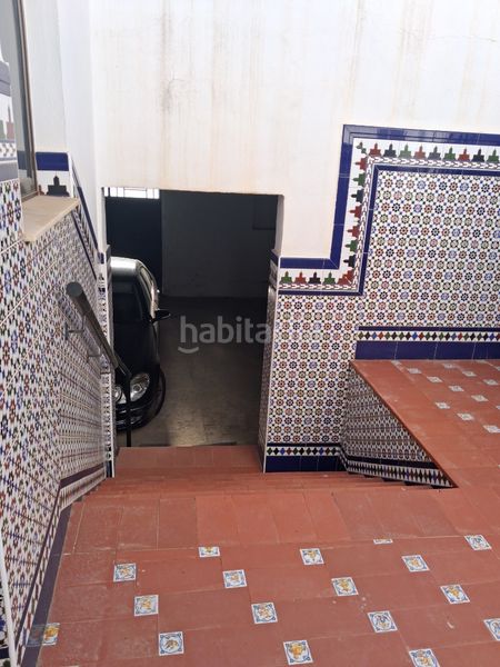 Foto 76858f9b-30ae-47c3-bc6f-3d4bbb1301ed. Casa amb aparcament a Puebla del Río (La)