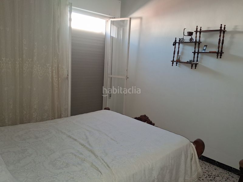 Foto 8f41dd7b-cb6b-420e-9a3b-361928f62300. Casa amb aparcament a Puebla del Río (La)