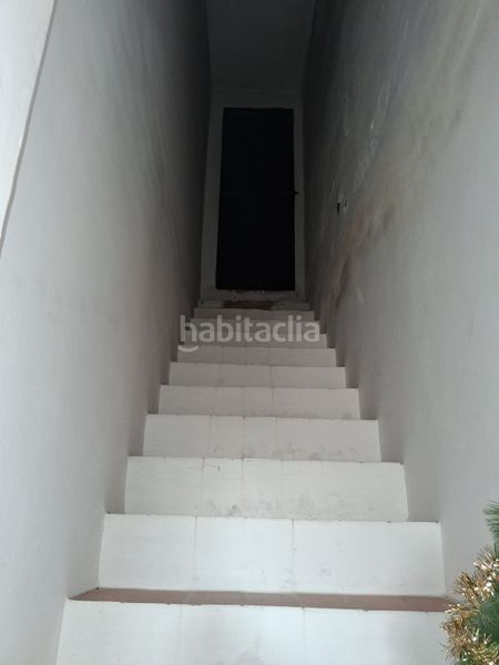 Foto ae3e212d-edd4-43cf-975d-1df82f6acc12. Casa amb aparcament a Puebla del Río (La)
