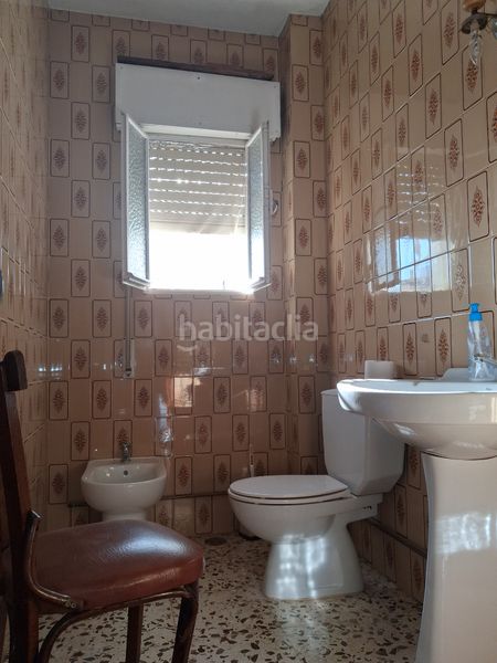 Foto bdf5a247-ee19-4453-91c8-e1bab78c2ff0. Casa amb aparcament a Puebla del Río (La)