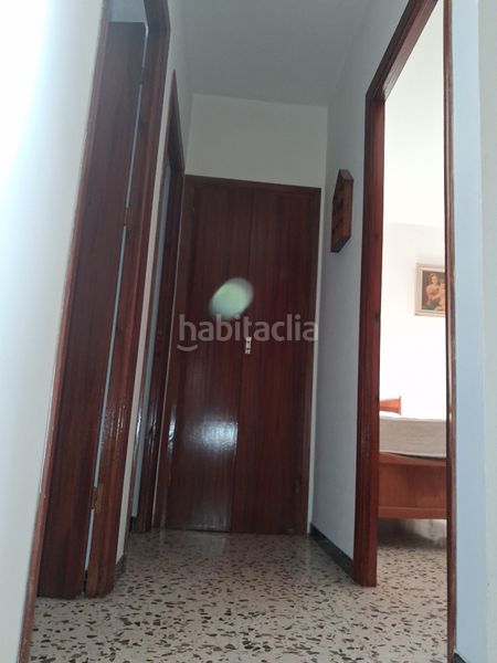 Foto c176d761-19a0-4994-891e-4e25e12f3762. Casa amb aparcament a Puebla del Río (La)