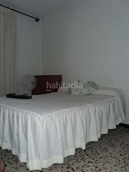 Foto ca601d62-7a9d-4cdc-addc-65bbf00efd06. Casa amb aparcament a Puebla del Río (La)