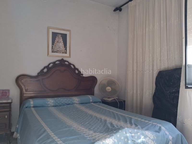 Foto ef6f57eb-b87d-428c-aae0-b04001601aa9. Casa amb aparcament a Puebla del Río (La)