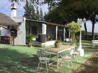 Masia a Almonte. Venta de finca en propiedad de 3.236 m2 de terreno, casa de aper