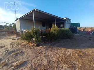 Masia a Bollullos Par del Condado. Venta de finca en propiedad de 5.000m2 de terreno con 2 contened