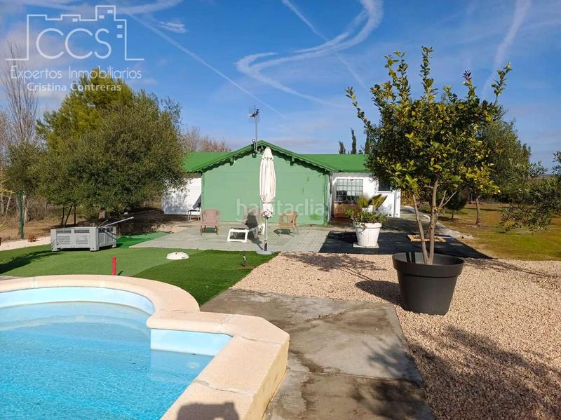 Foto 7e411079-cce6-4f62-a563-cdcff0a12be2. Masía venta de finca de 12.285 m2 de terreno con casa de madera de 85m2 construidos en rociana, huelva en Rociana del Condado