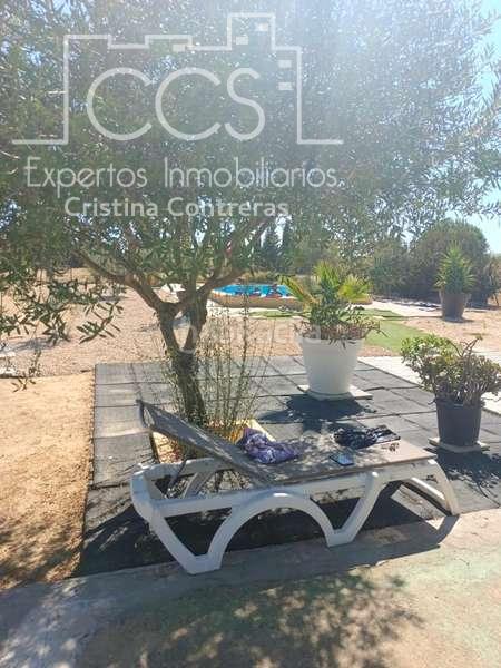 Foto ae7dd915-a626-45d9-8a02-e4946eac36ae. Masía venta de finca de 12.285 m2 de terreno con casa de madera de 85m2 construidos en rociana, huelva en Rociana del Condado