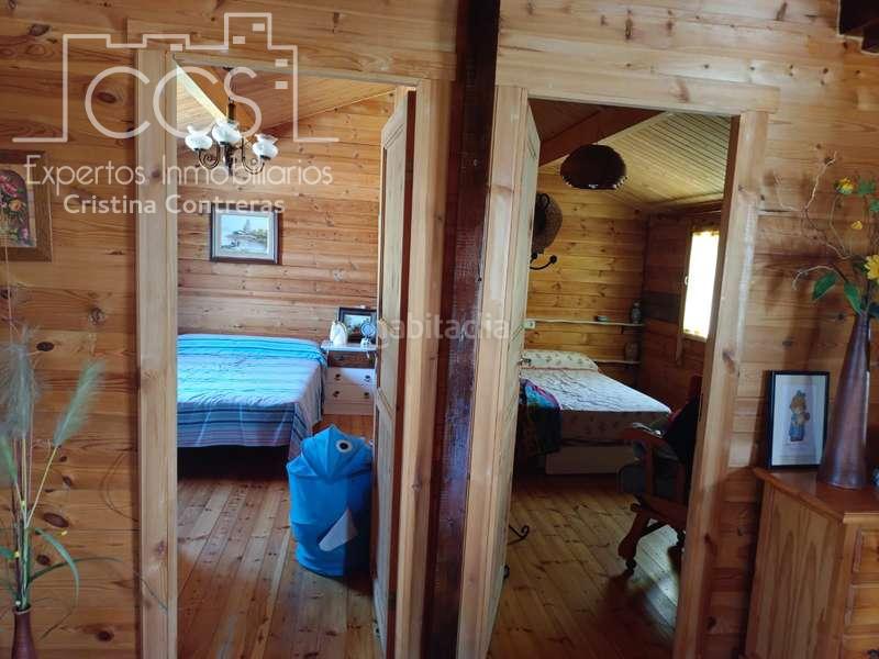 Foto e02ea550-51b0-411a-8f97-aa65ddba7ca8. Masía venta de finca de 12.285 m2 de terreno con casa de madera de 85m2 construidos en rociana, huelva en Rociana del Condado