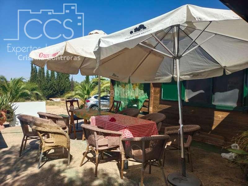 Foto e2ec33ce-1123-4b28-949e-d79538020db7. Masía venta de finca de 12.285 m2 de terreno con casa de madera de 85m2 construidos en rociana, huelva en Rociana del Condado