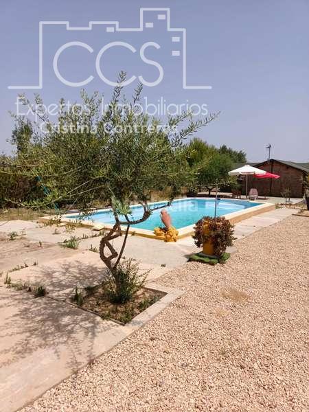 Foto eb42543c-97cd-42ce-867a-e365de54edc7. Masía venta de finca de 12.285 m2 de terreno con casa de madera de 85m2 construidos en rociana, huelva en Rociana del Condado
