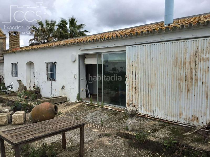Foto 1a15f6e0-f1f2-41fb-8c30-678f8fa6c010. Masía venta de finca de 4.236 m2 de terreno con 4 construcciones en total de 950,75 m2 en sevilla en Huévar