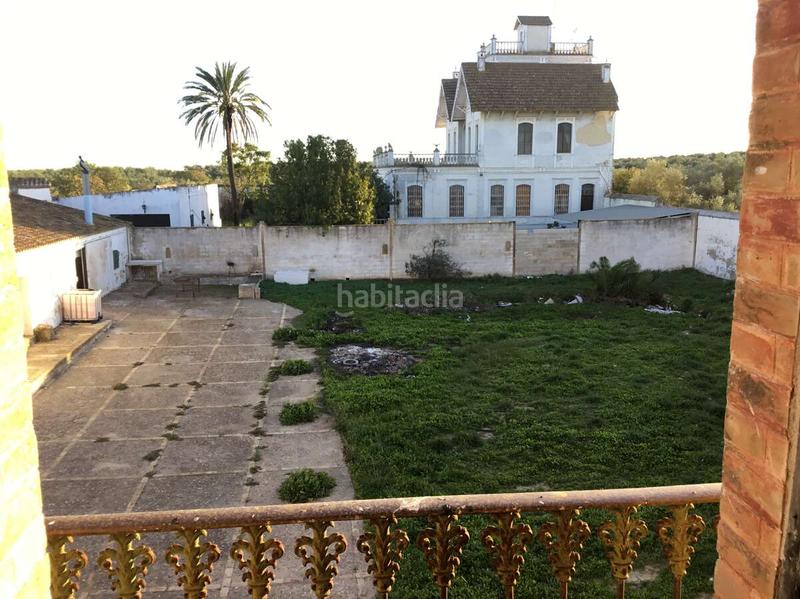 Foto 4cb3cfeb-d294-4a4e-833c-2150c381c396. Masía venta de finca de 4.236 m2 de terreno con 4 construcciones en total de 950,75 m2 en sevilla en Huévar