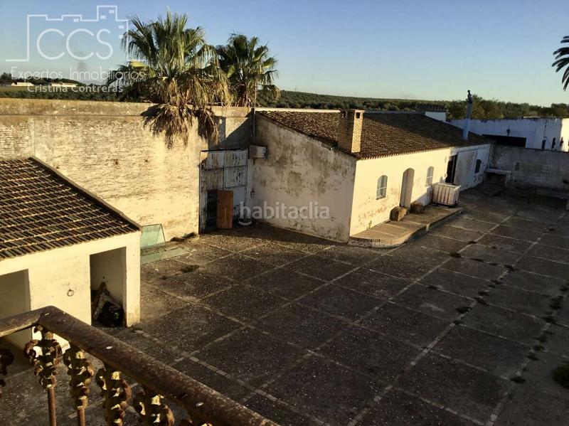 Foto 53e19055-035f-4238-bbb7-f2d2c049c7d8. Masía venta de finca de 4.236 m2 de terreno con 4 construcciones en total de 950,75 m2 en sevilla en Huévar