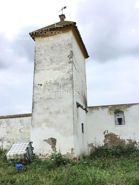 Foto de851ae1-ed2b-4e43-8973-7fb124cd41d4. Masía venta de finca de 4.236 m2 de terreno con 4 construcciones en total de 950,75 m2 en sevilla en Huévar