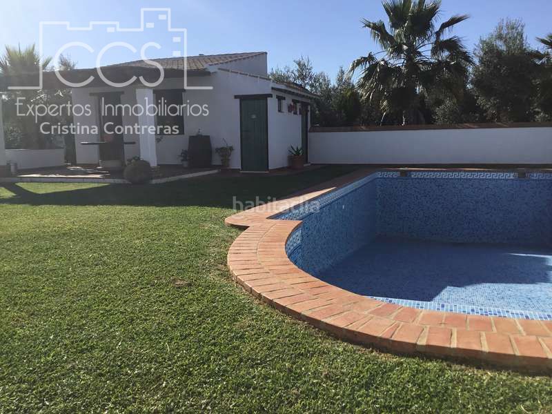 Foto cc314153-9b6b-4a96-9bc8-e5afd84f3378. Masia amb piscina a Pilas