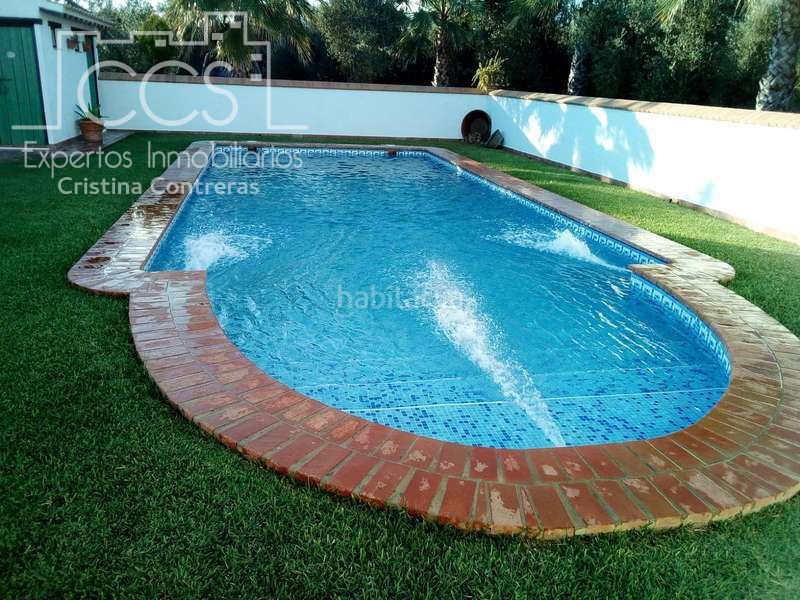 Foto f0700806-f9e0-441b-9e85-46779c32374f. Masia amb piscina a Pilas