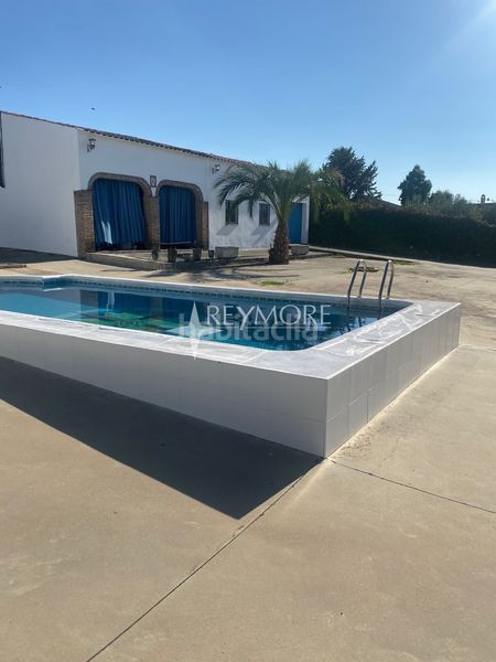 Foto cf64d292-afb3-4ded-afa3-ebbe7fc21f1f. Xalet amb calefacció aparcament piscina a El Higuerón Córdoba