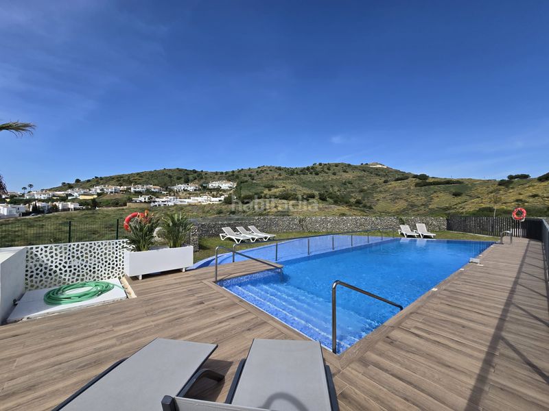Foto 0209f49a-ab6c-4c2b-a749-ad34c8a0a6cc. Casa aparellada amb aparcament piscina a Riviera del Sol Mijas