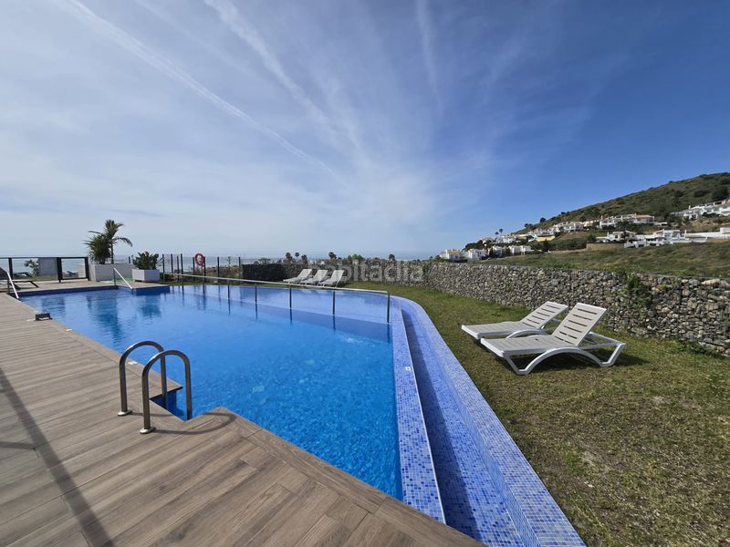 Foto 94c88ed0-1d69-4393-b5f3-282473c1eb97. Casa aparellada amb aparcament piscina a Riviera del Sol Mijas