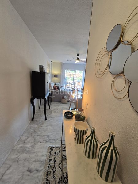 Foto 0da9b41d-471c-4481-b50a-11c4f6c6023d. Flat with parking pool in reserva de Marbella Marbella