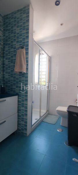 Foto e9fde6d6-16f3-4fc3-acd7-cc309a352821. Casa adosada en Benacazón