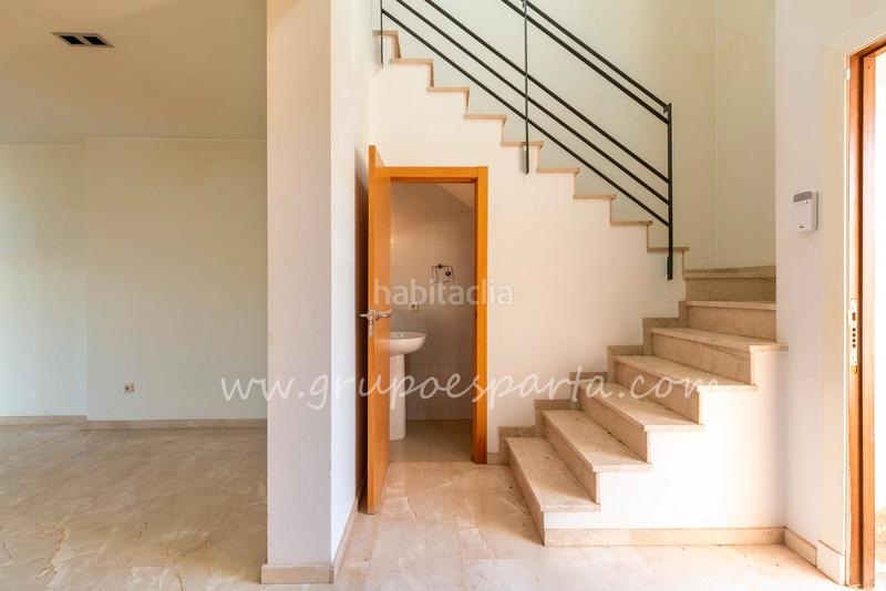 Foto 55d88cbc-75d9-4576-8355-203a6e550a59. Casa aparellada a calle moscatel 13 a Loreto Espartinas