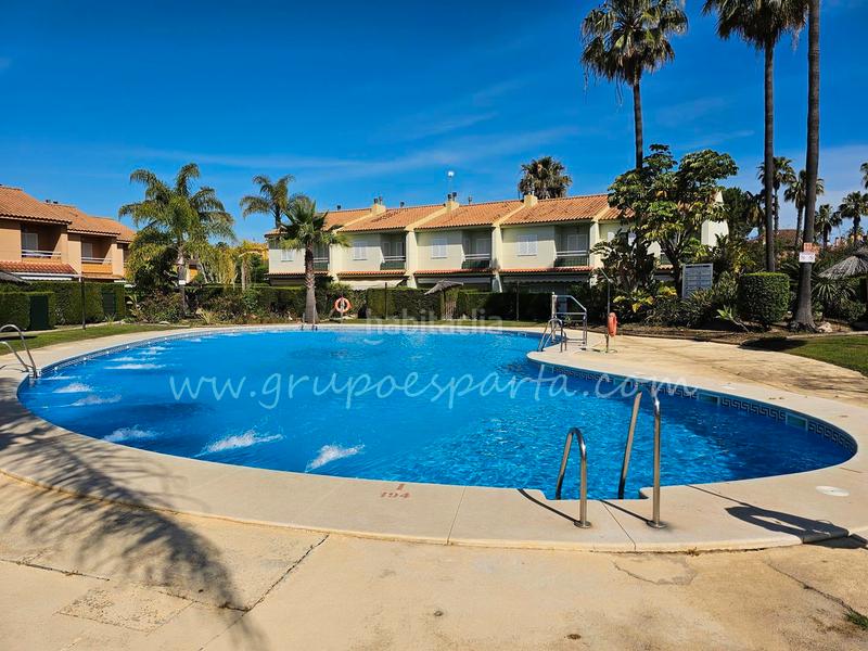 Foto 91f11a82-870e-4428-afbd-ccd76624a4e0. Reihenhaus in paseo flecha de nueva umbría 10 in Islantilla golf Islantilla