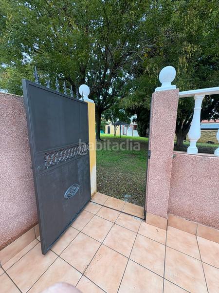 Foto b1fb62f1-f6b8-4c86-9c83-d955d38b0f17. Casa adosada en calle arrope 16 vivienda adosada con piscina comunitaria. en Villanueva del Ariscal