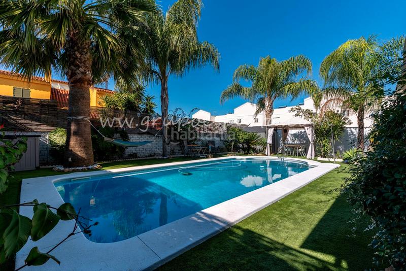 Foto 7a0cb6f4-21a9-46fb-8b37-a9c852118fab. Towny house with fireplace parking pool in Valencina de la Concepción