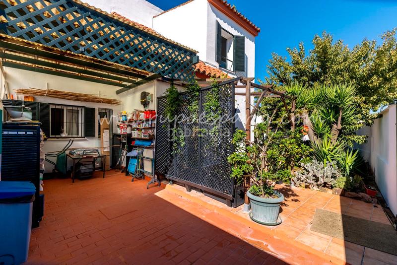 Foto 7c50dad8-9ab8-4d81-879d-f4222f406a98. Towny house with fireplace parking pool in Valencina de la Concepción