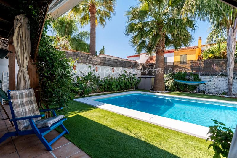 Foto 86f06932-5472-42e7-b274-4498be1b9d83. Towny house with fireplace parking pool in Valencina de la Concepción