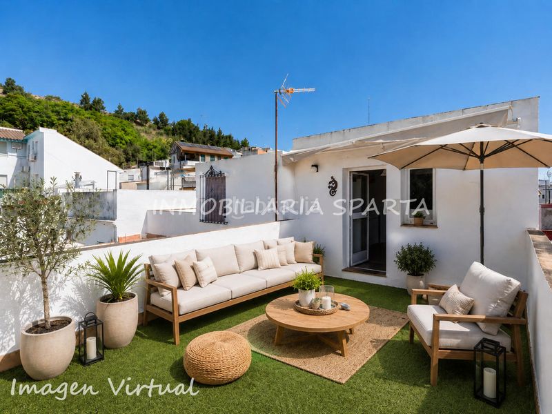 Foto ab1d406f-0f1d-4cb5-97af-b2b4cf97428e. Casa adossada a Gelves