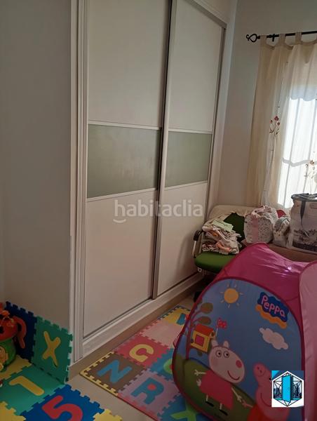 Foto 7afc8534-4f0f-41e0-90d8-aeca2324724d. Casa adossada amb aparcament a San Juan del Puerto