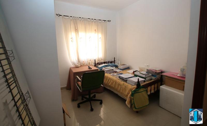 Foto f8e04b10-a7a5-44d6-bf16-4b36473b2531. Casa adossada amb aparcament a San Juan del Puerto