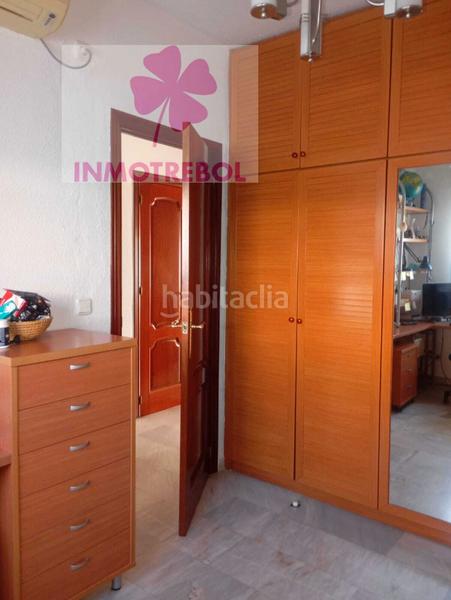 Foto 8346a75b-0cf0-491c-8f93-042e889110e3. Casa adossada a colores - entreparques Sevilla