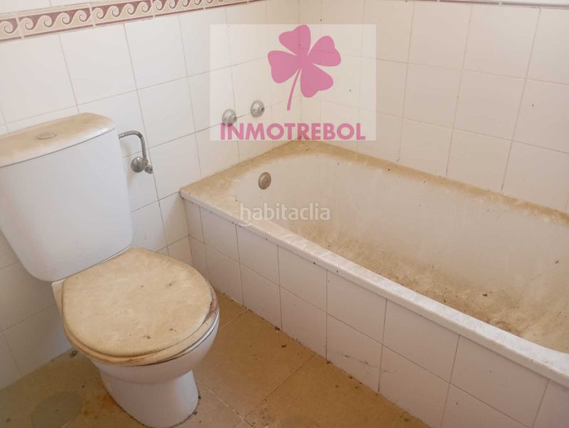 Foto 1622b04e-e56e-482d-aa58-00f11ad76624. Casa adossada a Puebla del Río (La)