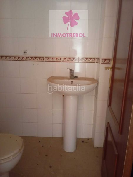 Foto 4ccf722e-36ea-47f0-a448-1f70de5bdfa5. Casa adossada a Puebla del Río (La)