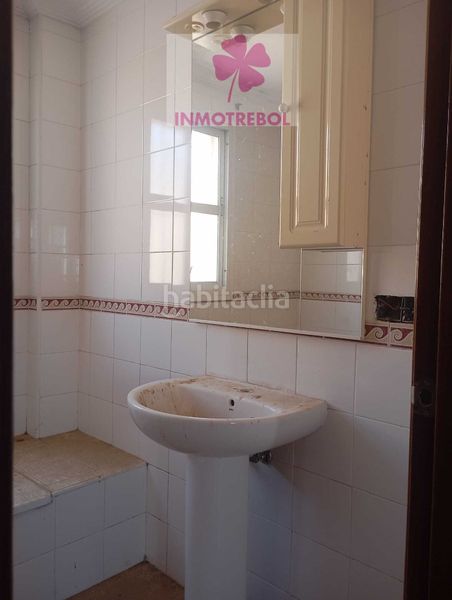 Foto 7c4cb951-d7f1-421b-8da6-fdef52a3c0a6. Casa adossada a Puebla del Río (La)
