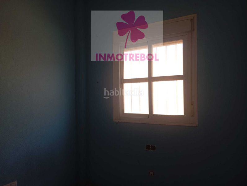 Foto 9234bee1-bd52-4937-bd57-4e555432dc06. Casa adossada a Puebla del Río (La)