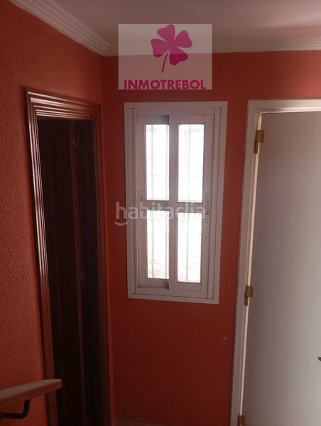 Foto e75a4731-135e-4a37-9deb-a05a9b0d25df. Casa adossada a Puebla del Río (La)