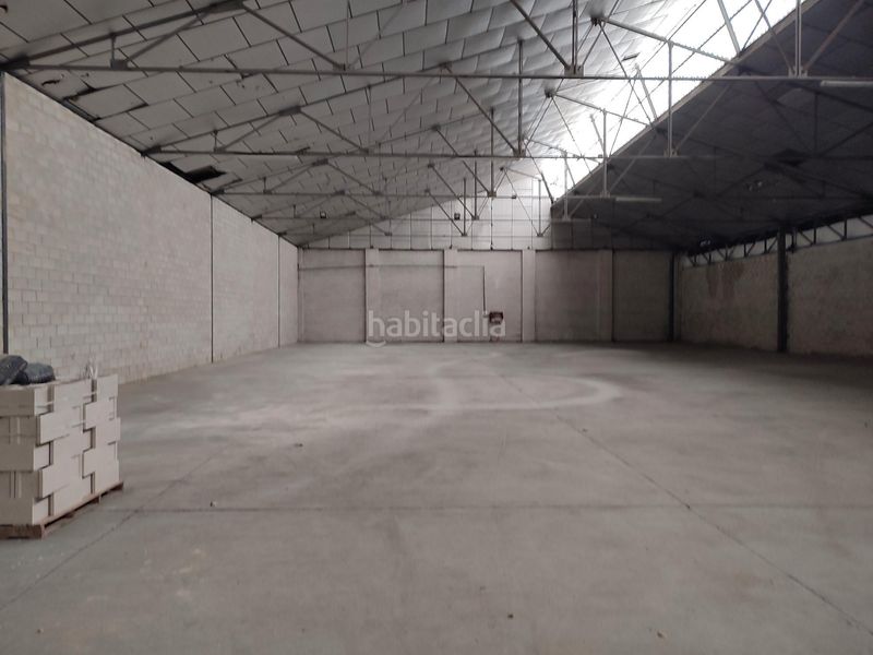 Foto f1b2db37-bd06-4c9c-9e27-9463384e04a2. Rent industrial building in Santa Clara Sevilla