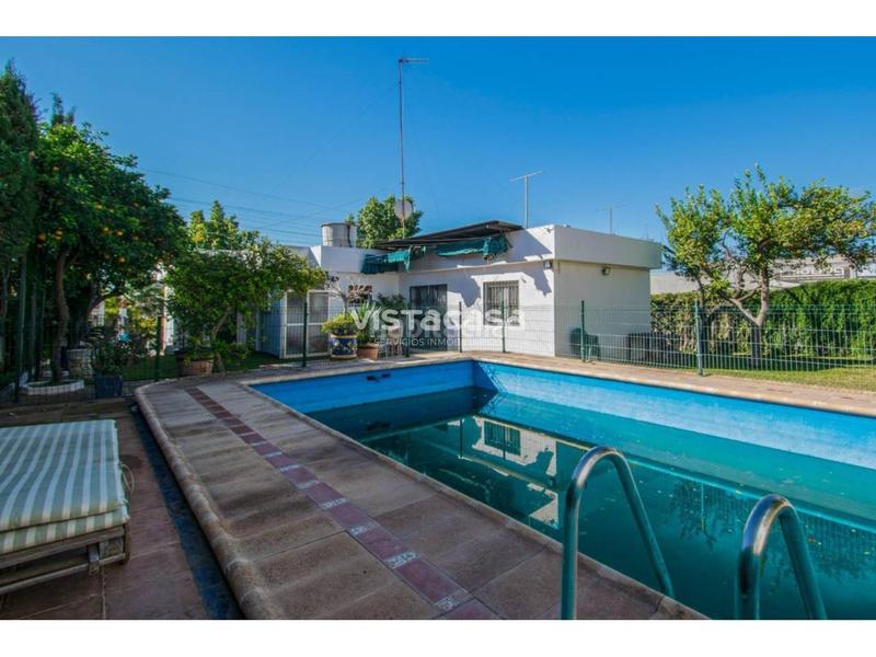 Foto 1f1d9120-6324-40aa-8526-8c4cf76a4bc7. Chalet con riscaldamento parcheggio piscina in La Paz Alcalá de Guadaira