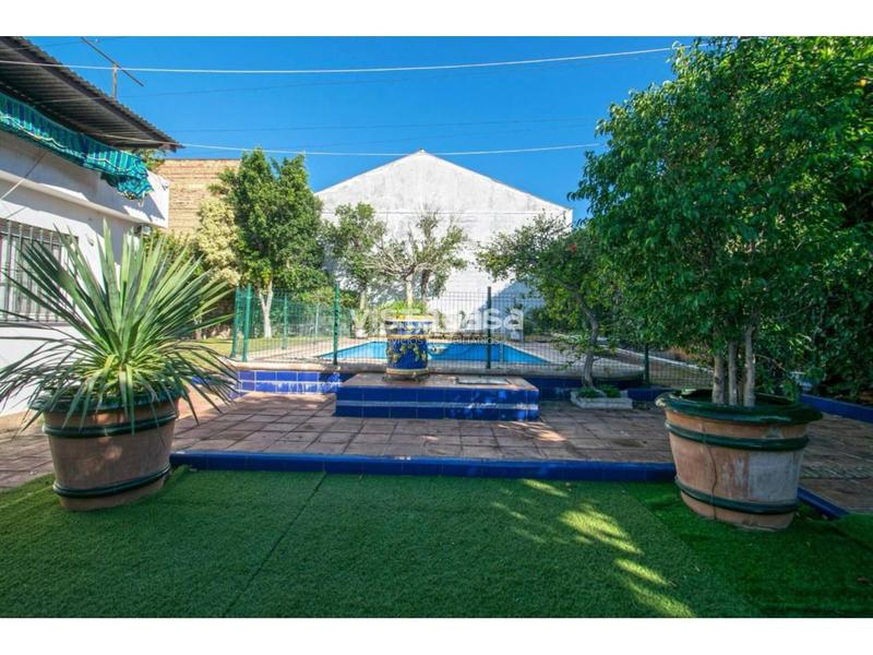 Foto 74a4276b-71c3-4099-949c-0cb7a569dbea. Chalet con riscaldamento parcheggio piscina in La Paz Alcalá de Guadaira