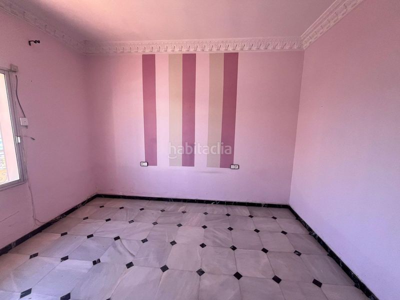 Foto cde4fdb0-cbca-4a3e-a241-8e5a4fc7ab73. Casa adossada a Umbrete