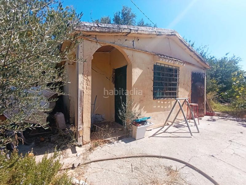 Foto cc0e5c17-d23a-4108-80fd-80343fa2403c. Masía en calle cáceres 23 en Cártama