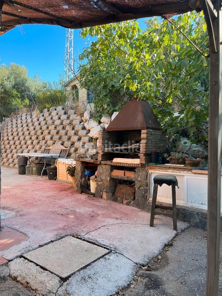 Foto f504d986-5a2f-4262-bb9c-e5a548f7f8e5. Masía en calle cáceres 23 en Cártama