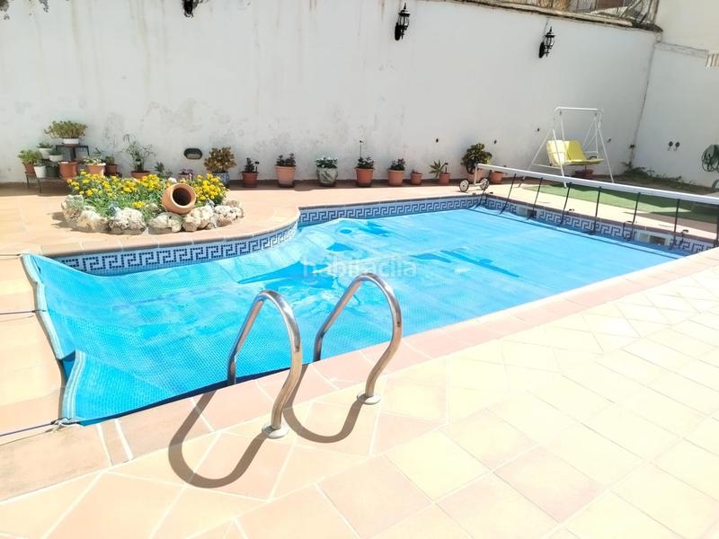 Foto 1888f16e-c7bf-4dc8-9ddd-e730a56107cb. Casa aparellada amb calefacció aparcament piscina a Güevéjar