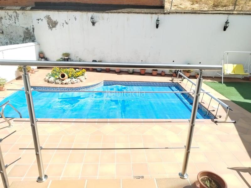 Foto 2c9a0c1e-e4b8-454c-8878-950708e06921. Casa aparellada amb calefacció aparcament piscina a Güevéjar