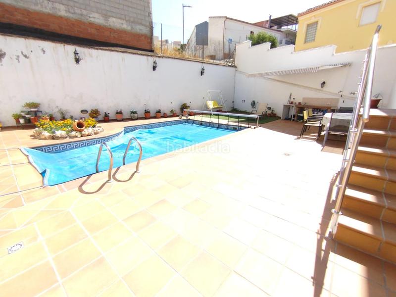 Foto b017dae6-e1c9-452e-a049-ee50b77b9b4b. Casa aparellada amb calefacció aparcament piscina a Güevéjar