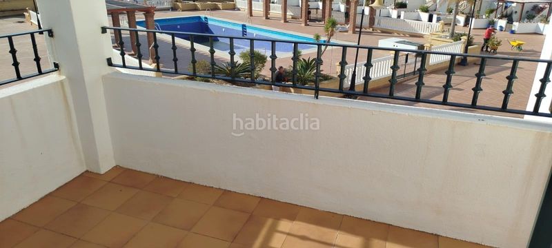 Foto 31280c1f-4201-4d26-8677-cc75ab22df5d. Casa adossada amb aparcament piscina a Calahonda - Carchuna Motril